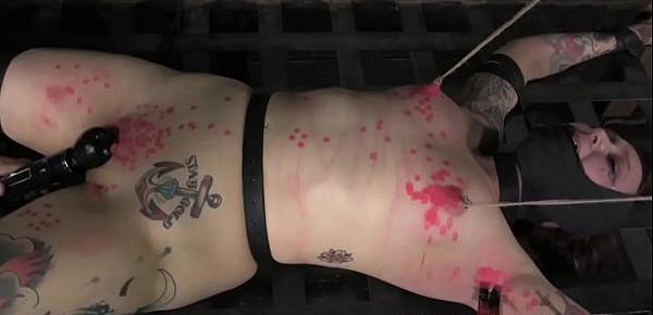  BDSM slave Mollie Rose covered in wax